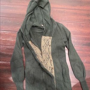 VERY flattering FreePeople sweater with amazing detail.